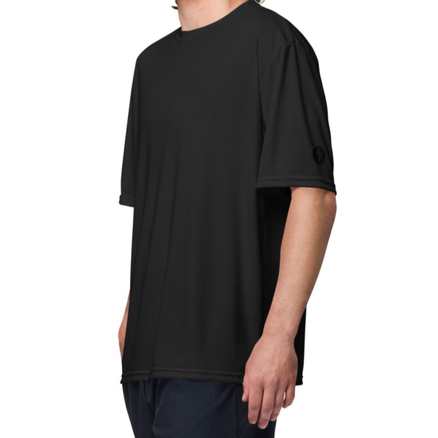 Black t-shirt worn by a person on a white background