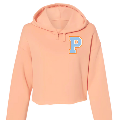 Peach-colored hoodie with a large blue 'P' on a white background