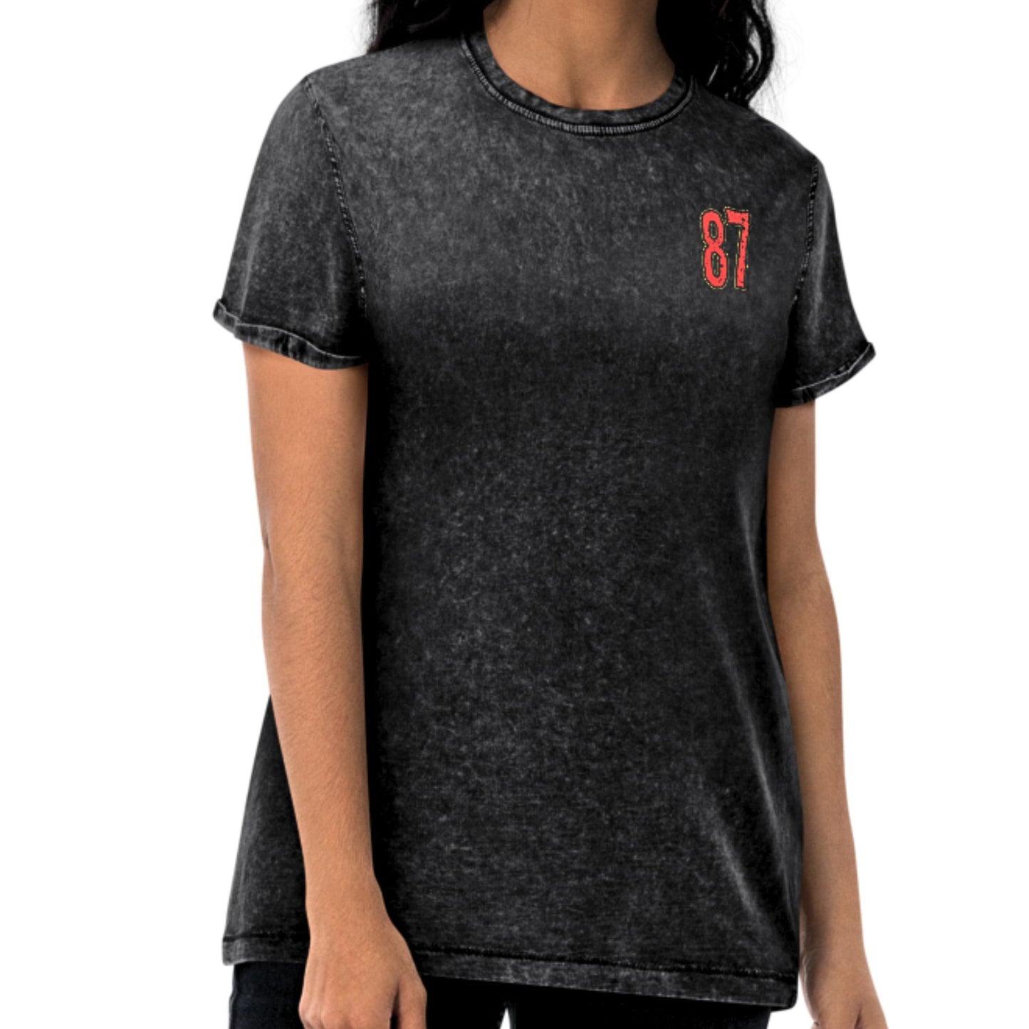 Black t-shirt with red number 87 on a white background