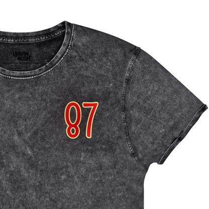Gray t-shirt with red number 87 on a white background