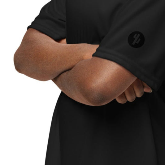 Person wearing a black outfit on a white background
