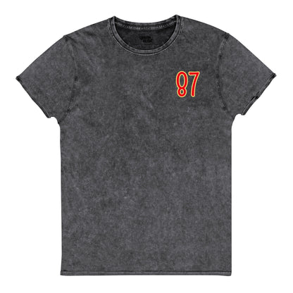 Black t-shirt with red number 87 on a white background